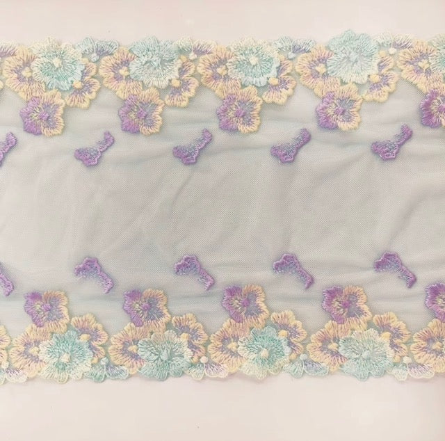 Encaje bordado con flores coloridas vibrantes para lencería
